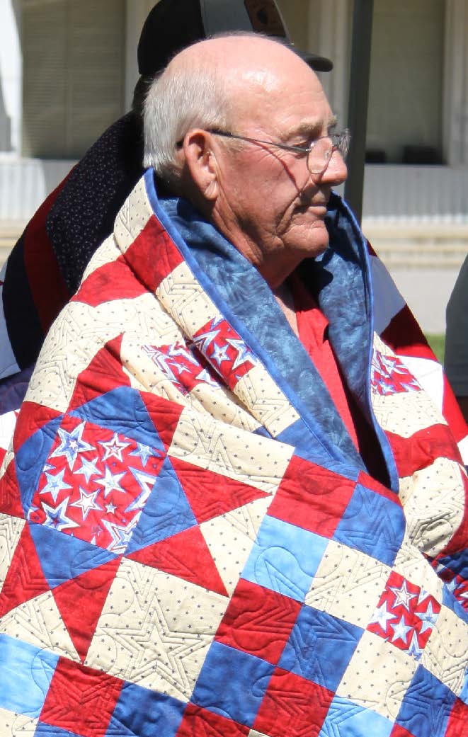 Sewcial Quilters Honor Veterans During Flag Day Ceremony